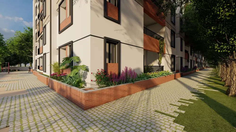 Paved walkways and planters along two sides of the building, with no vehicles on the ground floor